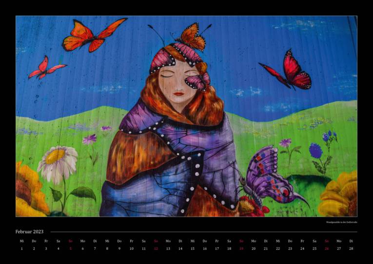 Malerei auf einer Betonwand: eine Frau vor einer Wiese mit Schmetterlingen